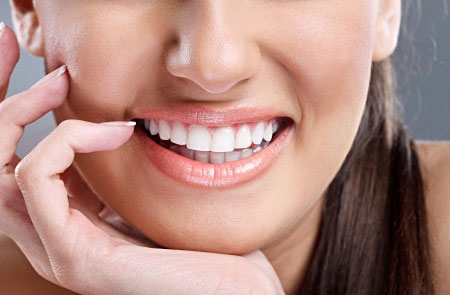How Teeth Whitening Can Improve A Faded Smile